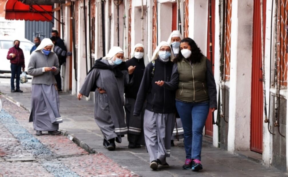 La batalla entre la economía y la salud, entre las fotos de la semana