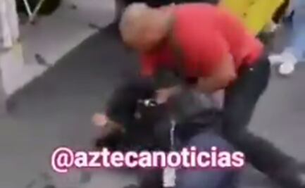 Video: Sujeto golpea a tránsito que intentaba colocarle una "araña" a su moto