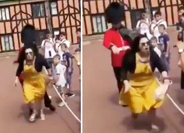 Video. Guardia real británico empuja a una turista que saltó cerco de seguridad