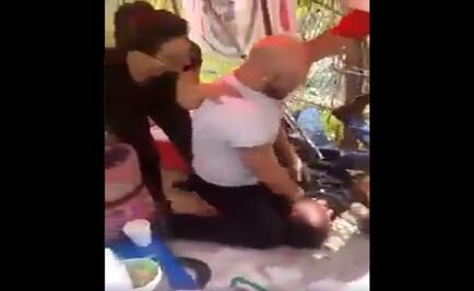 Detienen a pareja que golpeó a vendedor de nieves en Satélite