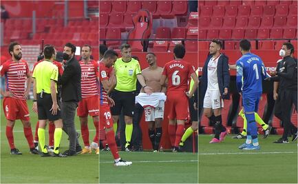 Jugadores del Sevilla vuelven del vestidor para terminar el duelo ante el Granada