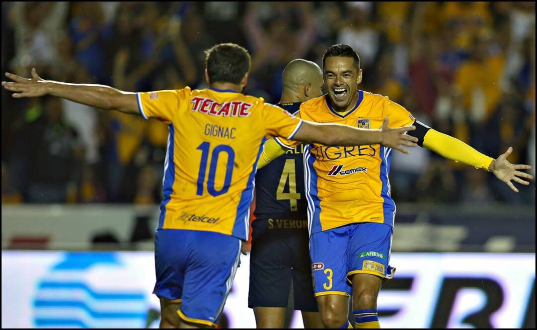 Gignac celebra uno de sus goles con "Juninho". Foto: Imago7