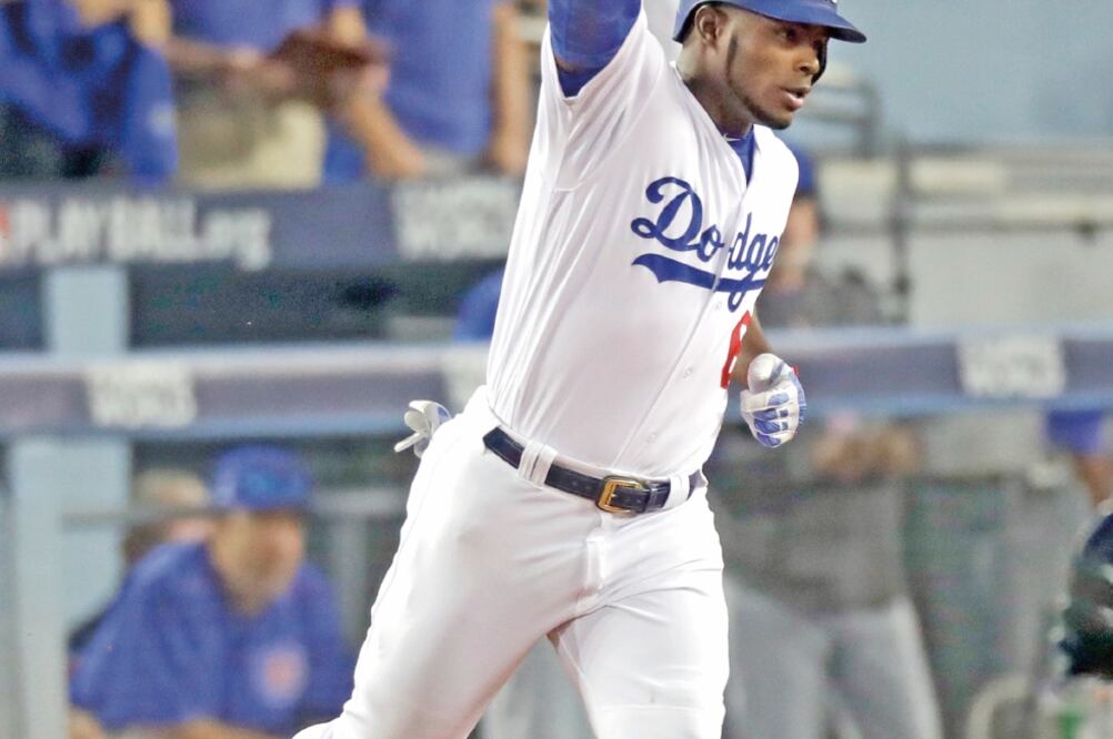 Foto: Yasiel Puig conectó un jonrón de dos carreras en la quinta entrada. ALEX GALLARDO. AP