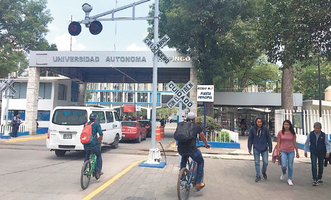 Rest ricc ión. La jornada electoral en la Universidad de Chapingo se realizó a puerta cerrada, sólo miembros de la comunidad ingresaron al campus. Foto: EMILIO FERNÁNDEZ. EL UNIVERSAL