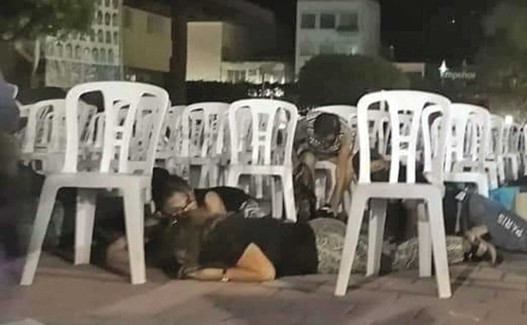 En cuanto sonaron los balazos la gente se tiró al piso. Foto: Tomada de video