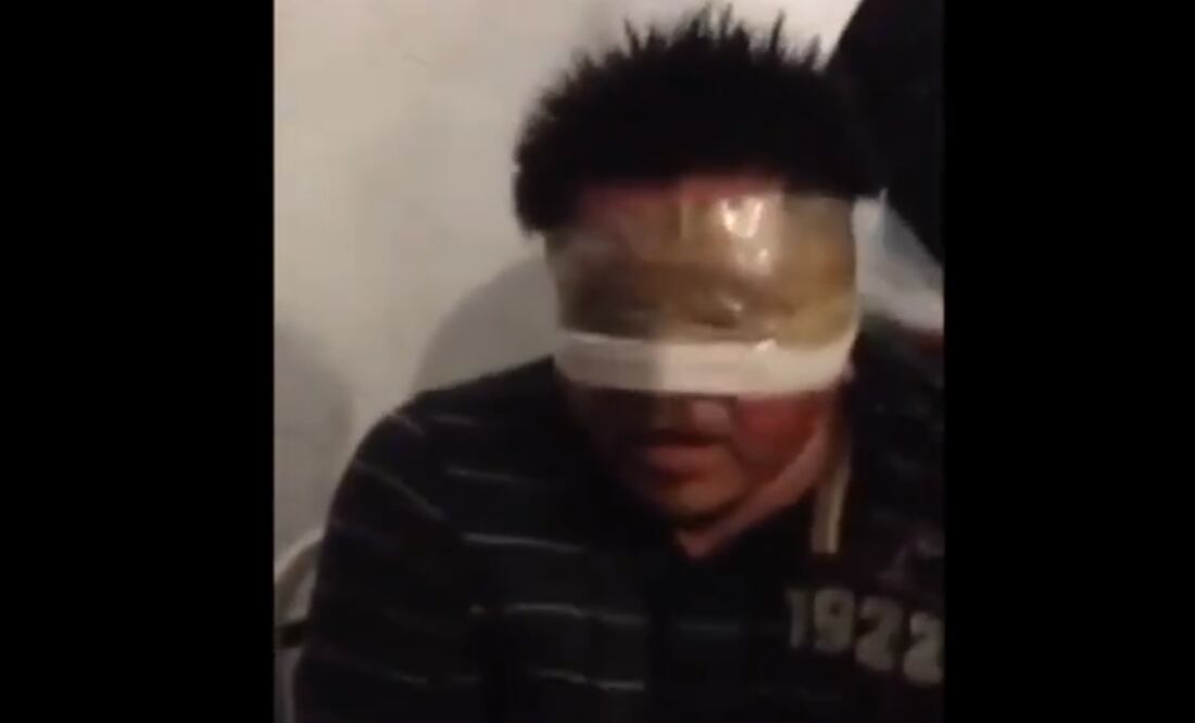 La grabación exhibe a un hombre maniatado, quien sería uno de los 122 detenidos por la entonces Procuraduría General de la República. Foto: Captura de pantalla