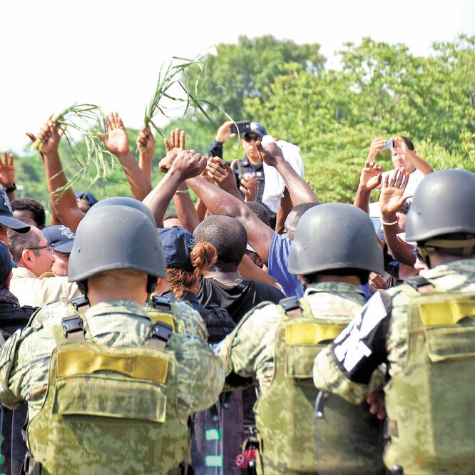 Elementos de la Guardia Nacional intervinieron ayer en un motín de migrantes extracontinentales en Tapachula. JACOB GARCÍA. EL UNIVERSAL