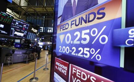 Fed recorta tasas de interés por primera vez desde 2008 y apunta a más bajas este año