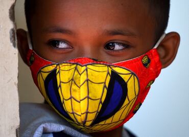 School-age children should also wear masks to tackle COVID-19, says WHO