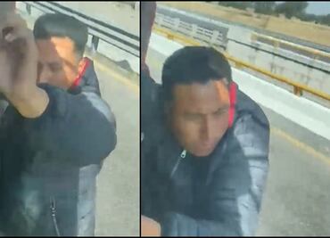 VIDEO: Sujeto intenta asaltar un tráiler y termina colgado de la puerta del conductor