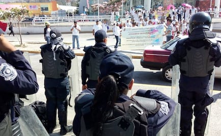 Marchan para exigir seguridad y los reciben antimotines