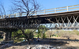 Intento de tumbar puente en caída de "El Mencho" fue un "escenario de guerra", cuentan habitantes; prevén demolición por daños
