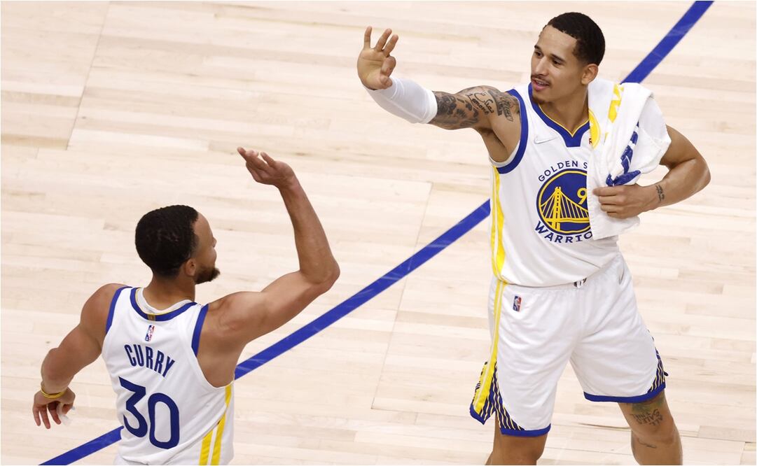 Curry y Juan Toscano en un juego con Golden State. FOTO: AFP