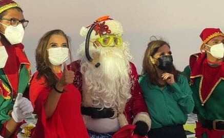 En moto acuática y con traje de baño, llega Santa Claus a playas de Cancún