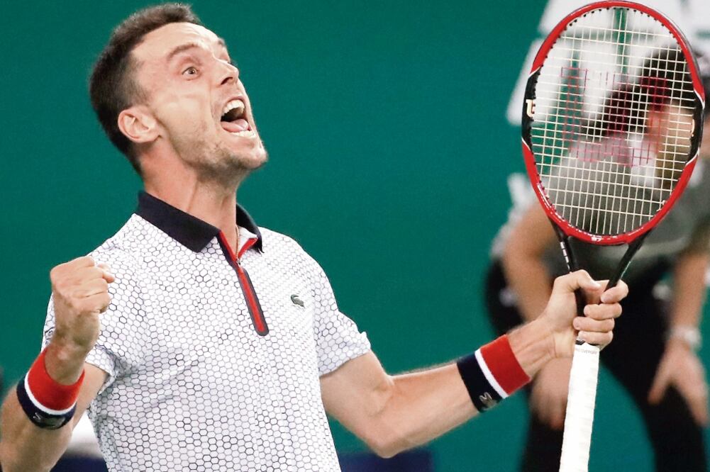 En cinco enfrentamientos, Roberto nunca había vencido al serbio (ANDY WONG. AP)