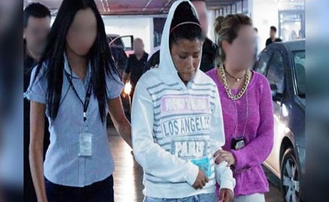 The presumed aggressor is escorted by undercover police. (Photo: SPECIAL)