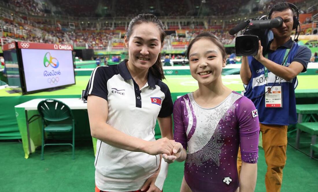 South Korean gymnast Lee Eun-ju, right, and her North Korean counterpart Hong Un Jong