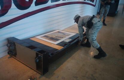 Caída de anuncios, causa de pánico en Aeropuerto de Cancún: GN