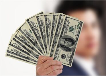 Actividad económica de EU mantuvo "ligera" expansión en marzo: Fed