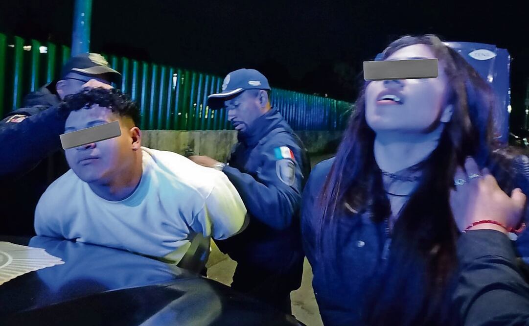 Pareja detenida, después de atropellar a un policía. Foto: Especial