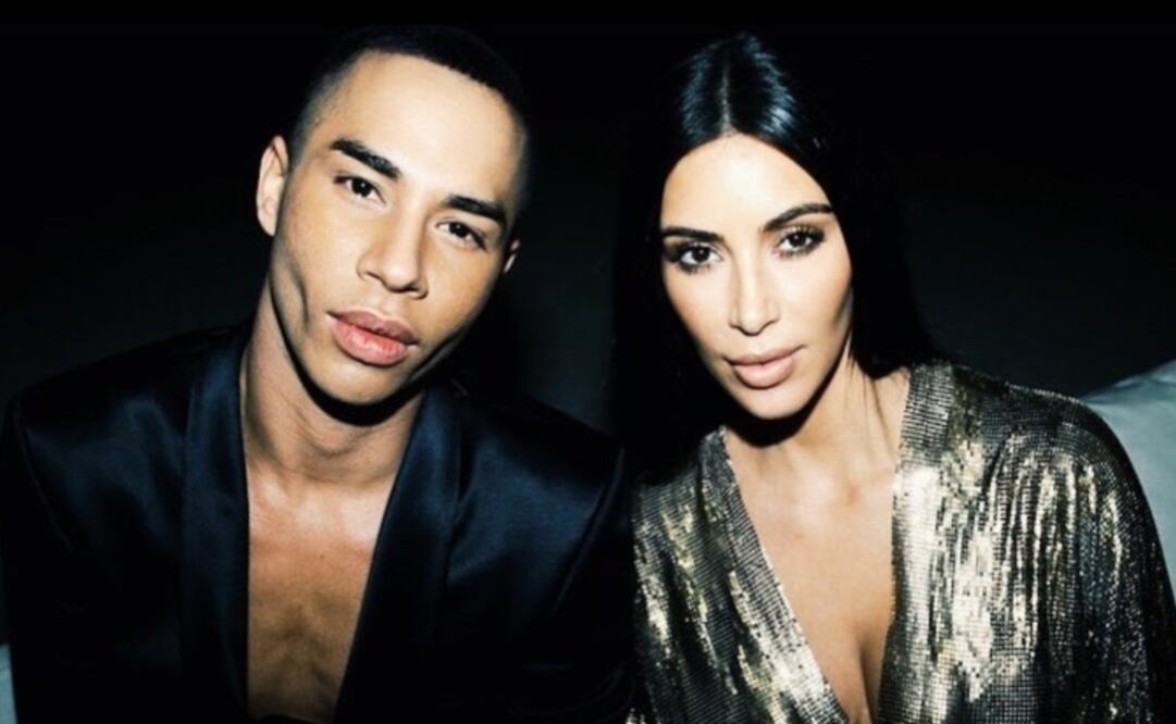 Olivier Rousteing y Kim Kardashian luciendo un rostro afilado