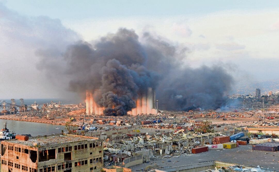 Smoke billows from harbor area with damage and debris after a large explosion rocked the harbor of Beirut, Lebanon – Photo: Wael Hamzeh /EFE/EPA