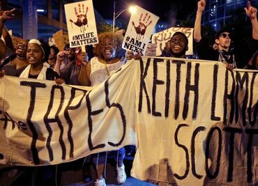 Afroamericano abatido en Charlotte tenía lesión cerebral: allegados