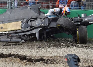 Alonso flips car after dramatic collission at Australian GP