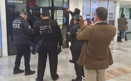 Desarticulan en AICM clonación de radios de la policía; la operación sucedía en un local "guardaequipajes"