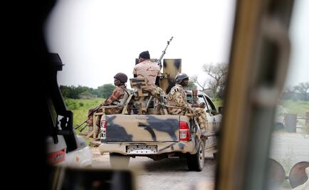 Militants kill around 100 Nigerian soldiers in attack on army base