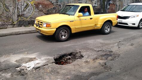 Daños por baches serán indemnizados en 10 días