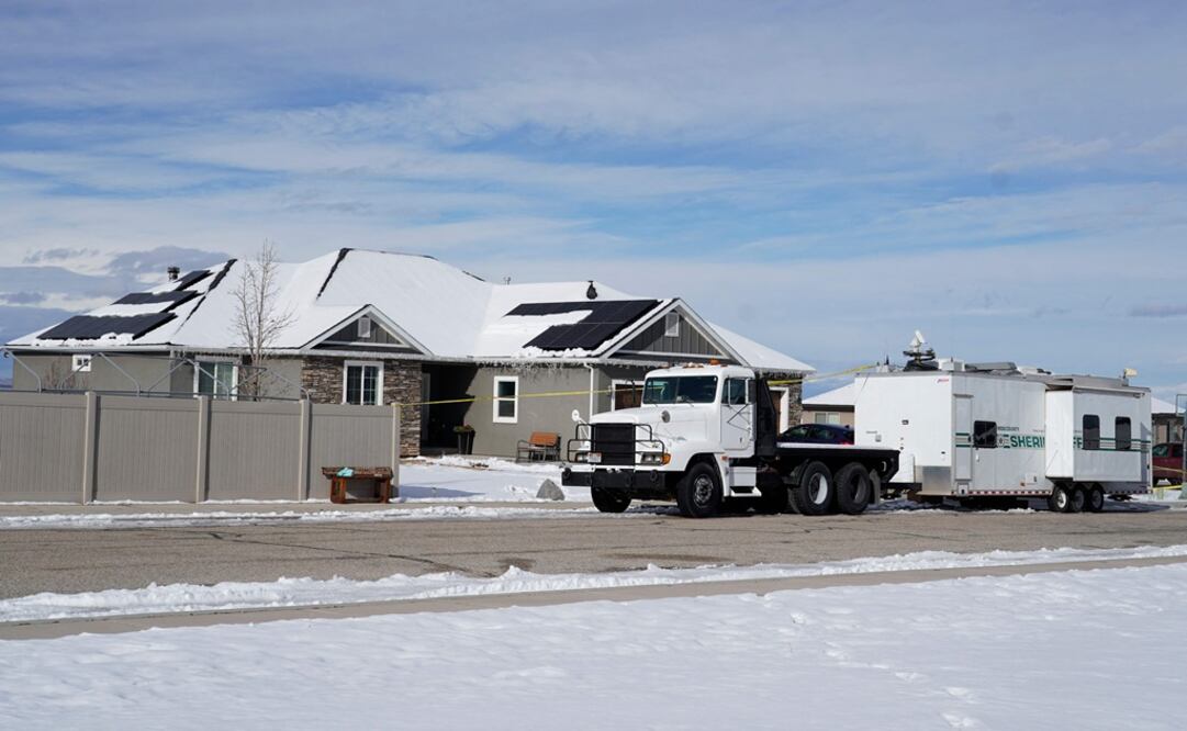 Un tráiler de la escena del crimen de la policía se encuentra afuera de la casa de Michael Haight en Enoch. Foto: AFP