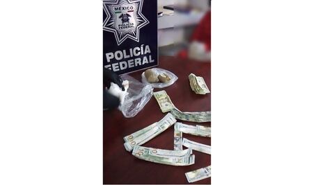 Detienen a colombiana con 52 mil dólares en Aeropuerto de la CDMX