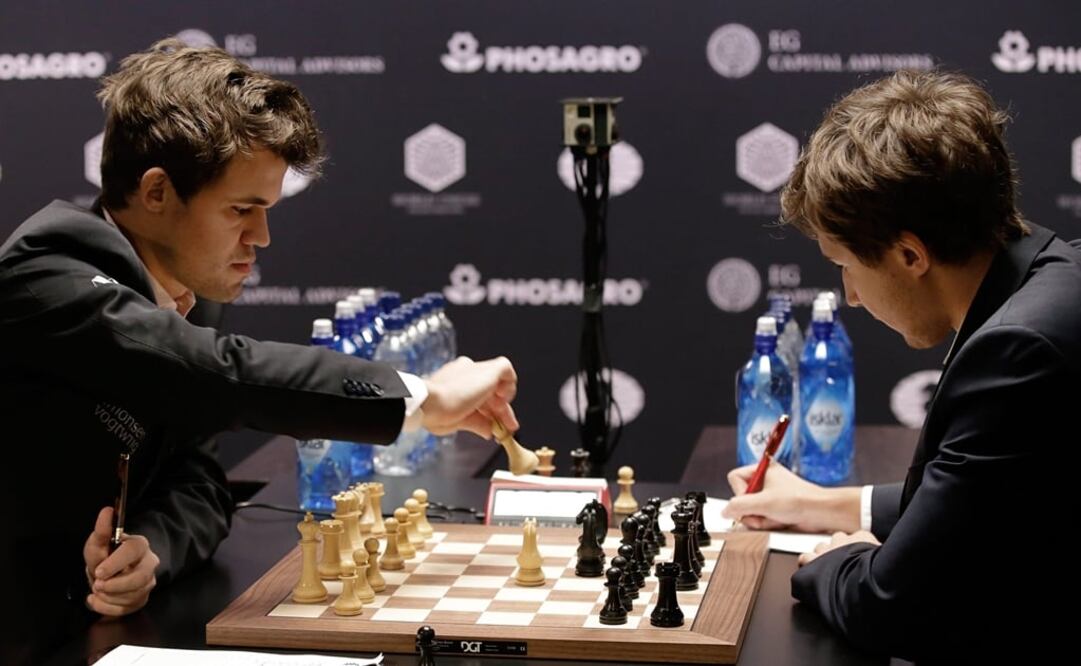 FOTO: Los maestros de ajedrez Magnus Carlsen y Serguéi Kariakin. (FOTO: EFE) 