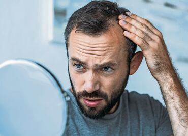 Disfunción eréctil y pérdida de cabello, nuevos síntomas del Covid prolongado