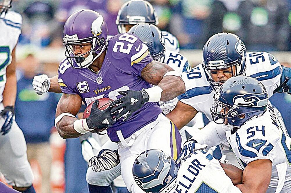 Frenar a Adrian Peterson es la clave para Seattle (BRUCE KLUCKHOHN. USA TODAY SPORTS)