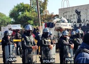 Policías municipales de Neza impiden traslado de residuos a tiradero en Bordo de Xochiaca