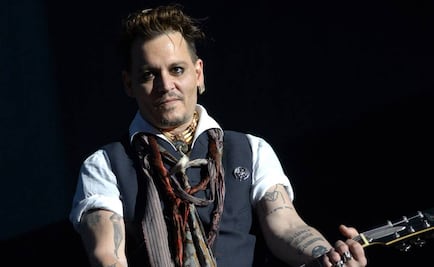 Captan a Johnny Depp en Suecia con misteriosa morena