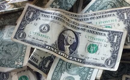 Se fortalece el dólar y caen bolsas previo al alza de tasas en EU