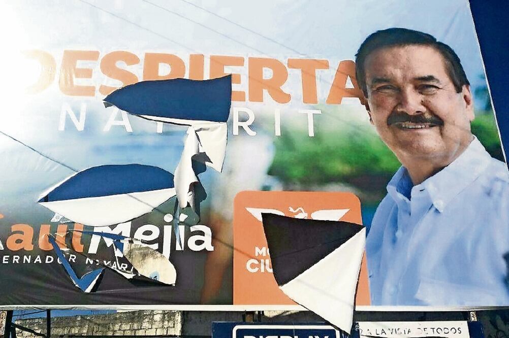 Los candidatos del PRI-PVEM-Panal, y de MC, Manuel Cota y Raúl Mejía, denunciaron la destrucción de sus anuncios en Tepic. (TOMADA DE FACEBOOK)