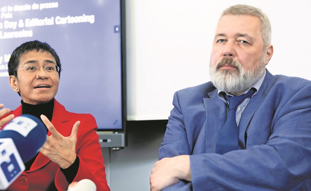 La periodista filipina Maria Ressa, con su colega ruso Dmitry Muratov, Premios Nobel de la Paz 2021, ayer en Ginebra. Foto: Salvatore Di Nolfi/AP 
