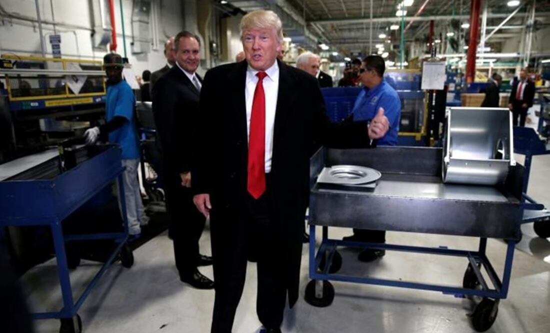 U.S. President-elect Donald Trump speaks to members of the news media as he tours a Carrier factory in Indianapolis, Indiana, U.S., December 1, 2016. REUTERS/Mike Segar