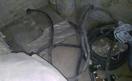 Hallan toma clandestina conectada a ducto de Pemex en casa de Tlalnepantla