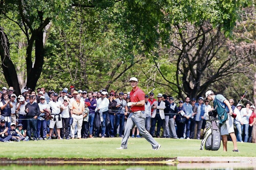 El español Jon Rahm dio pelea a Dustin y lo logró empatar en el hoyo 14. (ALEX CRUZ. EFE)
