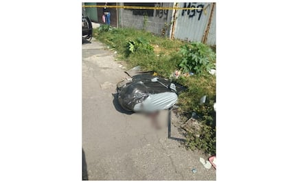 Localizan cadáver de mujer envuelto en bolsa de plástico en Ecatepec