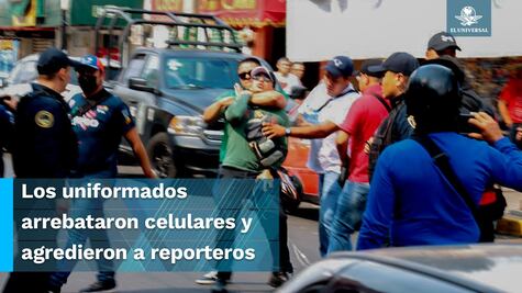 Policía aplica la "llave china" a reportero tras captar agresión a mujer por parte de un elemento 