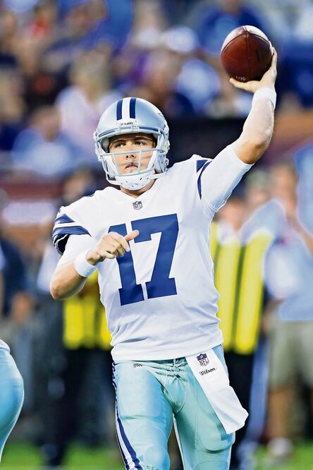 Kellen Moore abrió el duelo como titular de Cowboys (JOE ROBBINS. AFP)