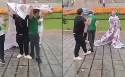 Madres buscadoras denuncian a aficionados mexicanos por agresiones; toman lona con rostros de desaparecidos
