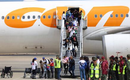 Llega a Venezuela avión con 313 migrantes, 151 de ellos niños; fueron repatriados desde México