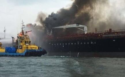 Apoyan a tripulación de buque incendiado 